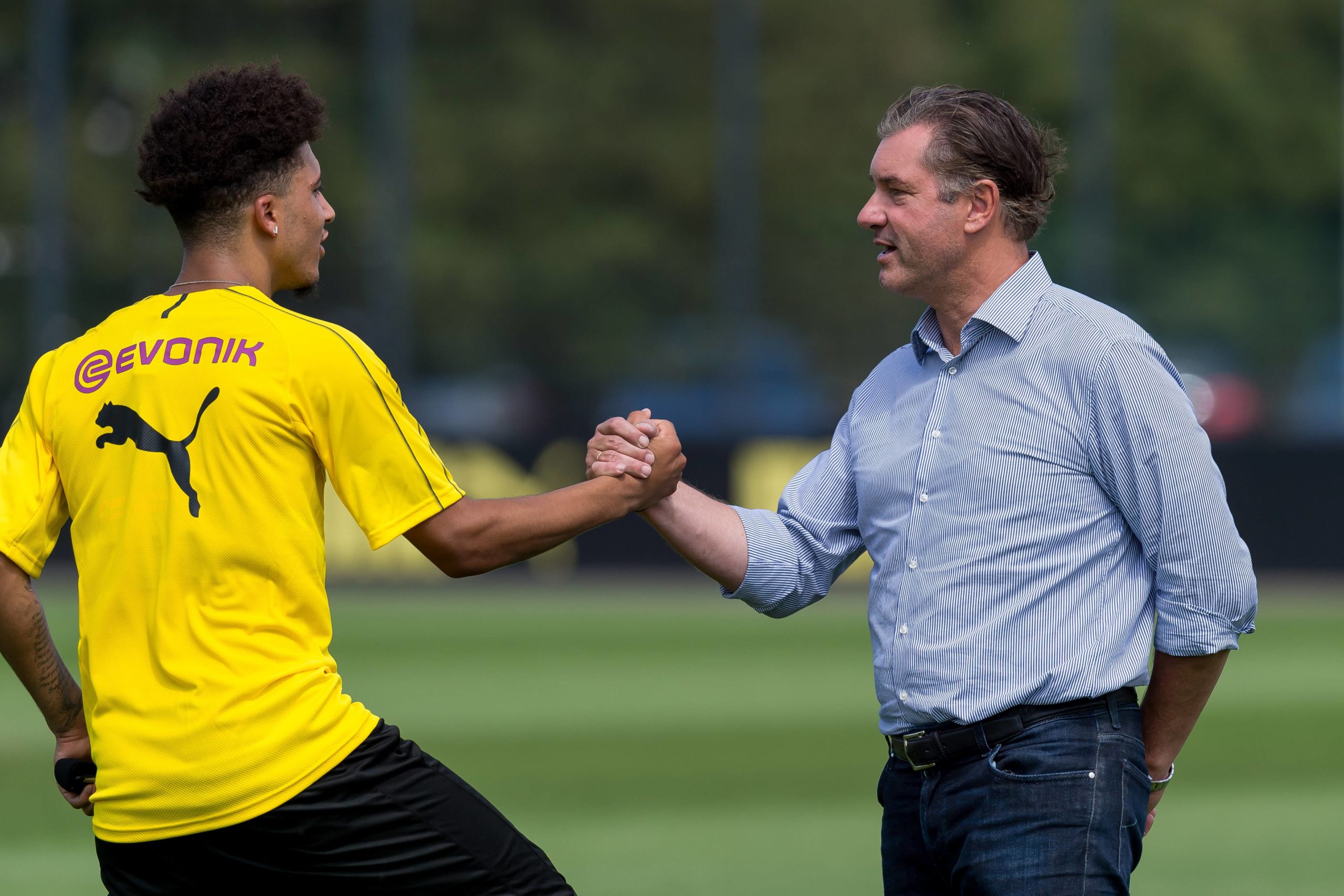 Michael Zorc und Jadon Sancho